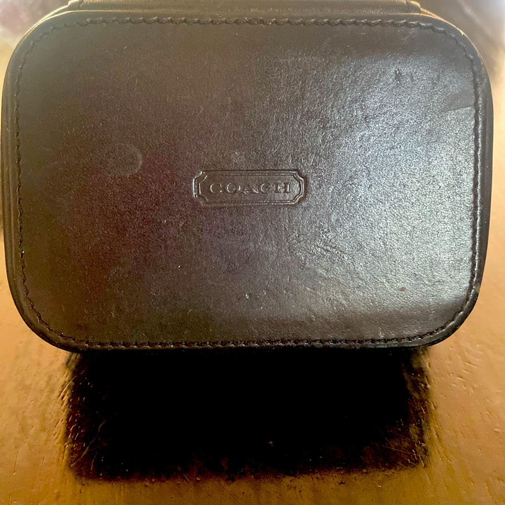 Black leather coach pill box
